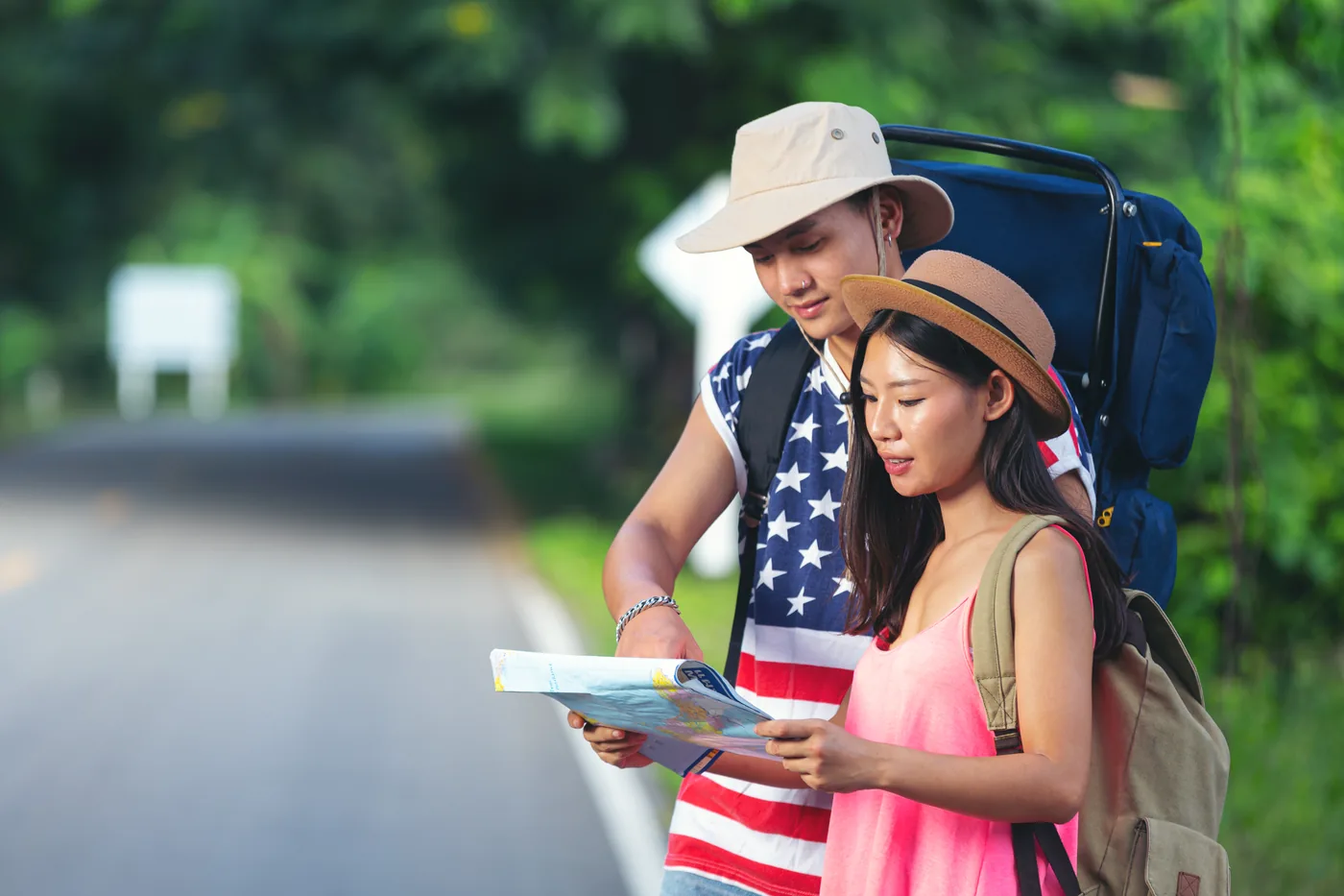 Travelers exploring together with a map