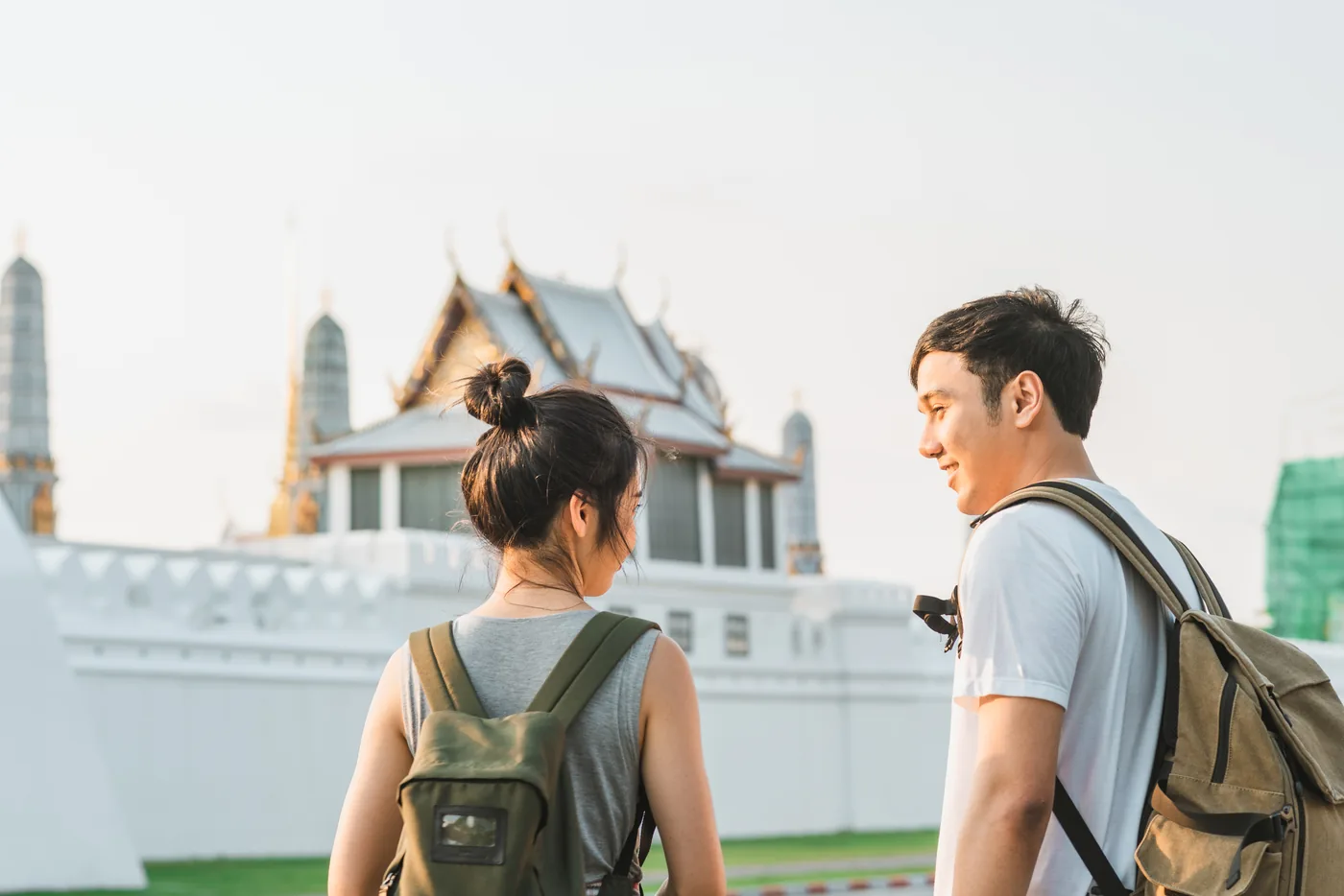 Travelers admiring temple architecture